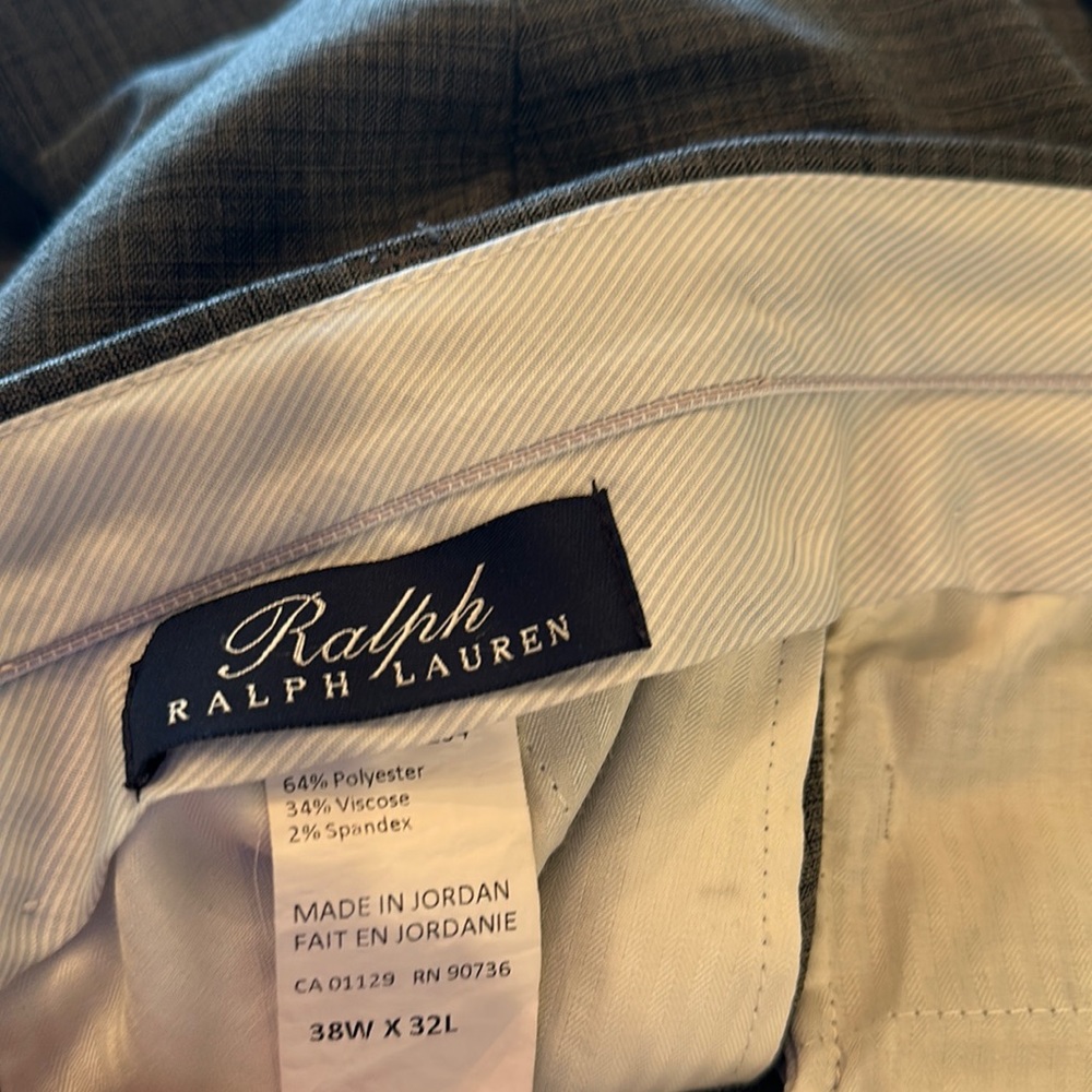 Medium gray with small black lines. Lightweight. Normally fits someone in a 36.